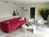 Our @modshop1 sofa, vintage birds, Adler lamps complete the upstairs living room. Photo 7 of Gayfields modern home