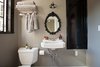 Powder Room, Artful East Sacramento Home by Jill Dudensing Lifestyle + Design Photo 4 of Artful East Sacramento Home by Jill Dudensing Lifestyle + Design modern home
