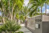 Modern home with Outdoor, Front Yard, Hardscapes, Trees, Walkways, Gardens, and Garden. Clean lines, with the design being more sculptural than utilitarian. Design being a priority but privacy was a must. Photo of Modernist Retreat