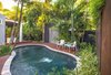 Modern home with Outdoor, Side Yard, Garden, Trees, Hardscapes, Shrubs, Walkways, Standard Construction Pools, Tubs, Shower, Gardens, Wood Patio, Porch, Deck, Plunge Pools, Tubs, Shower, Small Pools, Tubs, Shower, Decking Patio, Porch, Deck, Metal Fences, Wall, and Landscape Lighting. A small garden with large impact was created by keeping the lines clean, groupings of plants species to a minimum, well-defined areas and strong focal points at the end of the garden paths that accentuate the long views. Photo 5 of Von Phister