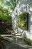Modern home with Outdoor, Back Yard, Garden, Hardscapes, Gardens, Walkways, Trees, Landscape Lighting, Wood Patio, Porch, Deck, and Decking Patio, Porch, Deck. A living wall was designed to create interest on an otherwise blank wall making the small seating area more inviting. Photo 7 of Von Phister