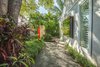 Modern home with Outdoor, Side Yard, Garden, Trees, Back Yard, Shrubs, Gardens, Hardscapes, Walkways, Wood Patio, Porch, Deck, Landscape Lighting, and Decking Patio, Porch, Deck. Defined areas and strong focal points help to create a sense of space within a small garden. Photo 6 of Von Phister