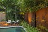 Modern home with Outdoor, Small Patio, Porch, Deck, Decking Patio, Porch, Deck, Wood Patio, Porch, Deck, Landscape Lighting, and Metal Fences, Wall. Feature walls and well positioned lighting add to the drama of this small garden. Photo 12 of Von Phister