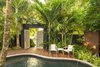 Modern home with Outdoor, Garden, Walkways, Side Yard, Gardens, Small Pools, Tubs, Shower, Hardscapes, Trees, Plunge Pools, Tubs, Shower, Standard Construction Pools, Tubs, Shower, Wood Patio, Porch, Deck, Decking Patio, Porch, Deck, Landscape Lighting, and Metal Fences, Wall. Clean lines and mass groupings of plants help create a sense of openness and space within a small garden. Photo 11 of Von Phister