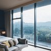 Modern home with Windows and Metal. The room concept and design were executed by Ryohin Keikaku, and focus around a quality sleeping experience. As such, spaces include a simple material and furniture palette, indirect lighting, and high-grade mattresses. The brand writes, "Muji Hotel seeks to provide a physical experience of the Muji philosophy through the texture of the towels, the placement of outlets and light switches, menu and venue of the restaurant, and more." Photo 3 of Muji Hotel