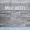Modern home with Exterior and Stone Siding Material. The hotel is sited near the downtown area in a multi-use complex. Seventy-nine rooms are combined with an on-site gym, library, diner—and a two-floor Muji store is the cherry on top for a complete immersion into the Muji experience. The brand sums up its new hospitality concept as both "anti-gorgeous and anti-cheap": "The goal is to offer great sleep at the right price, provide a space supporting both body and soul while away from home, and connect travelers to local communities." Photo 2 of Muji Hotel