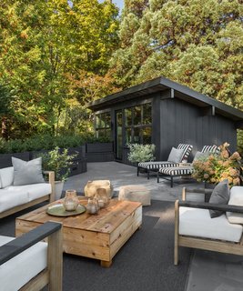 The roof terrace offers an outdoor lounge space, as well as views into the Seattle hills.