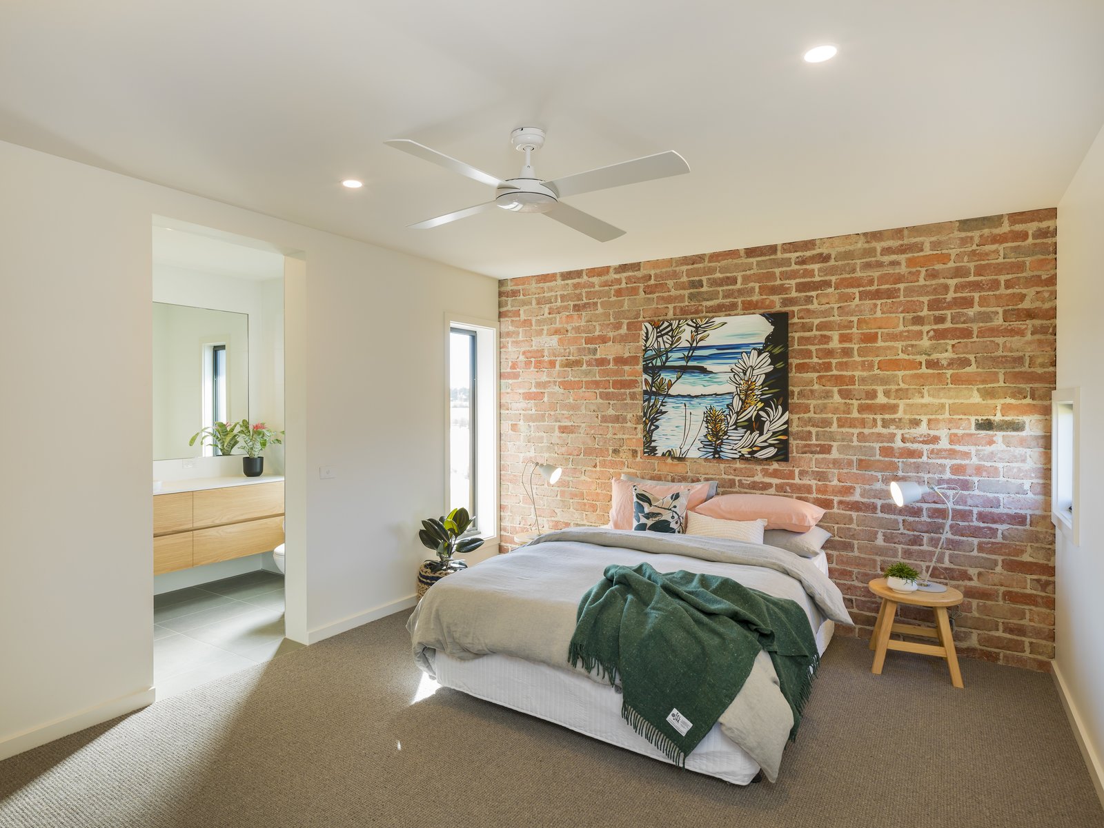 The throw blanket on the bed is from Seljak Brand, a company that produces recycled wool blankets from offcuts to encourage zero waste.