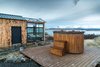 Modern home with Outdoor, Front Yard, Hot Tub Pools, Tubs, Shower, Decking Patio, Porch, Deck, Wood Patio, Porch, Deck, Walkways, Small Patio, Porch, Deck, and Post Lighting. The soaking tub is consistently heated to 102 degrees. Photo 4 of Panorama Glass Lodge