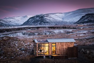 The motto for the Panorama Glass Lodge states "Where the sky is," which works as a fitting descriptor for the design of this cozy 248-square-foot vacation cabin. Thanks to the glass panels that wrap around a strategically placed bed, the bright dancing lights of the aurora can be viewed from the most comfortable spot.