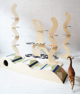 According to Michael Yarinsky, the idea to design a line of attractive cat furniture came about while he and friend Aelfie Oudghiri were "drinking a bit too much" and questioning why mainstream cat accessories were so ugly. Then and there, Yarinsky—an interdisciplinary designer who works in architecture, interiors, and furniture, and runs Brooklyn's Cooler Gallery—and Oudghiri, founder of the Aelfie rug and home goods company, decided to collaborate on their own cat furniture. "The idea with the series was to fall somewhere between cat furniture and sculpture," writes Yarinsky.
