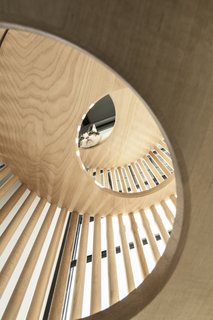 Neko writes that carpenters use a "painstaking nail-less method in which small wooden rods known as 'dabo' are inserted one by one...The wooden bars are then treated with a thin layer of urethane, combining the feel of natural wood with the durability needed to resist cat scratches."