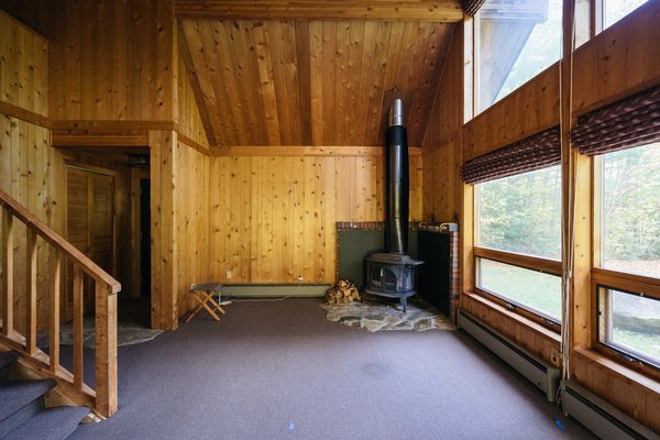 Before: When the couple bought the cabin, its good bones were apparent, and they knew they'd just need to make small tweaks to freshen it up.
