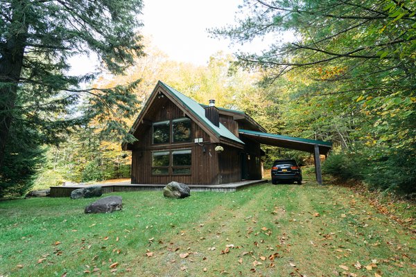 The 1,089-square-foot cabin sits on 1.5 acres of land.
