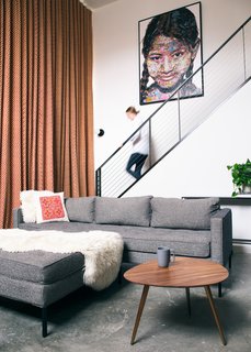 Homeowners Kathryn Heller and Kevin Short tackled much of the work themselves to refashion a dated home into the ultimate, 700-square-foot city loft. 