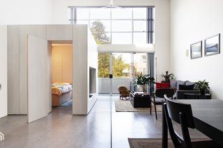 Rather than relocate, architect Rebal Knayzeh devises a flexible, mobile bedroom with built-in storage space.