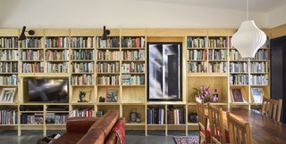 The interior walls and integrated shelving throughout are clad in solid hoop pine.