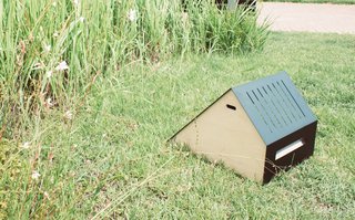 The perforated steel fosters air flow and lets the dog see out easily. The house arrives flat-packed and is assembled with powerful magnets.