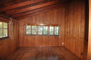 Before: An old sunporch was split into two rooms, with one side becoming the master bathroom to create an en-suite. 