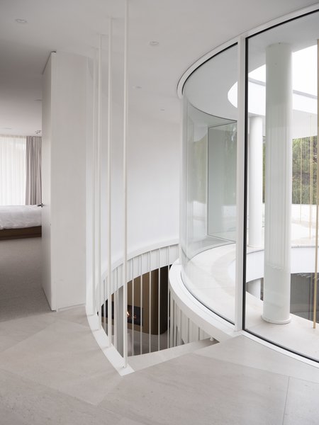 Best 60 Modern Staircase Design Photos And Ideas Dwell The Staircase Is Suspended On Steel Rods And Borders Atrium In Order To Bring