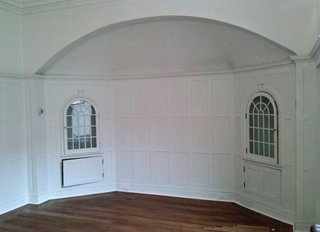 Before: the existing kitchen for the triplex was downstairs and accessed by a dumbwaiter and servant staircase, so the clients transformed the formal dining room into a combined kitchen/dining room.