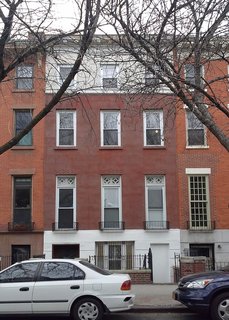 Before: When the new owners bought the house, it was set up as a single-family house with the kitchen at the garden level. The renovation created a two-bedroom rental apartment at the garden level and a three-floor unit above.