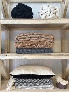 "The store is featuring these linen and wool rugs that are hand woven on the grounds of this stunning, 12th-century monastery. Even the plants used to dye the wool is grown on-site, and the rugs are soft beyond belief," says Ruffalo. The store’s textile selection also includes alpaca throws by Brahms Mount, hand-woven silk knots by Bartleby Objects, and a silk woven pillow with velvet backing hand-sewn by Abbatte.
