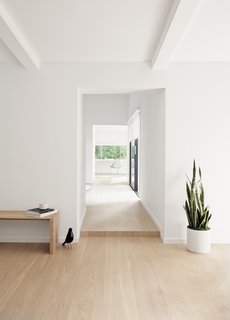 The view down the hall to the office shows how the spaces flow together.