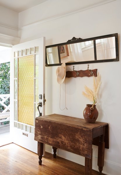 Rossi installed a new front door with amber bottle glass, the latter salvaged from the firm’s Guthrie House project in Palm Springs.