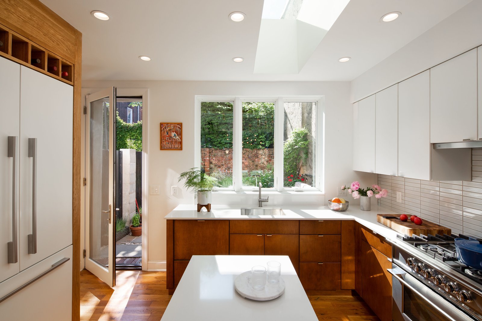 Creating a connection between the kitchen and backyard makes the room 