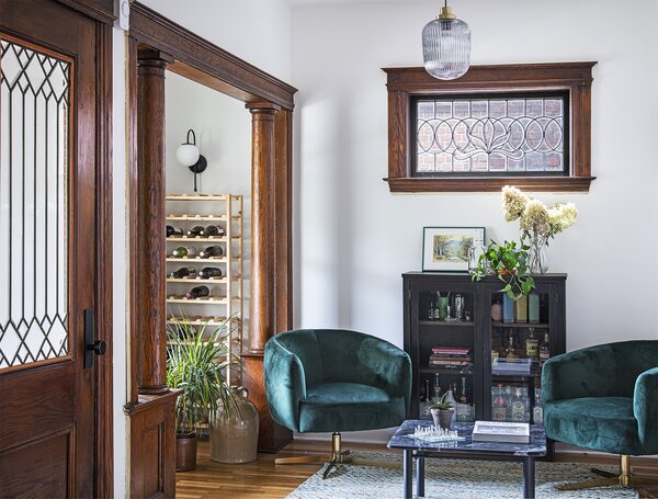 The refurbished entry doubles as a bar space. Nearby, a former bedroom was converted into an office for Drake.
