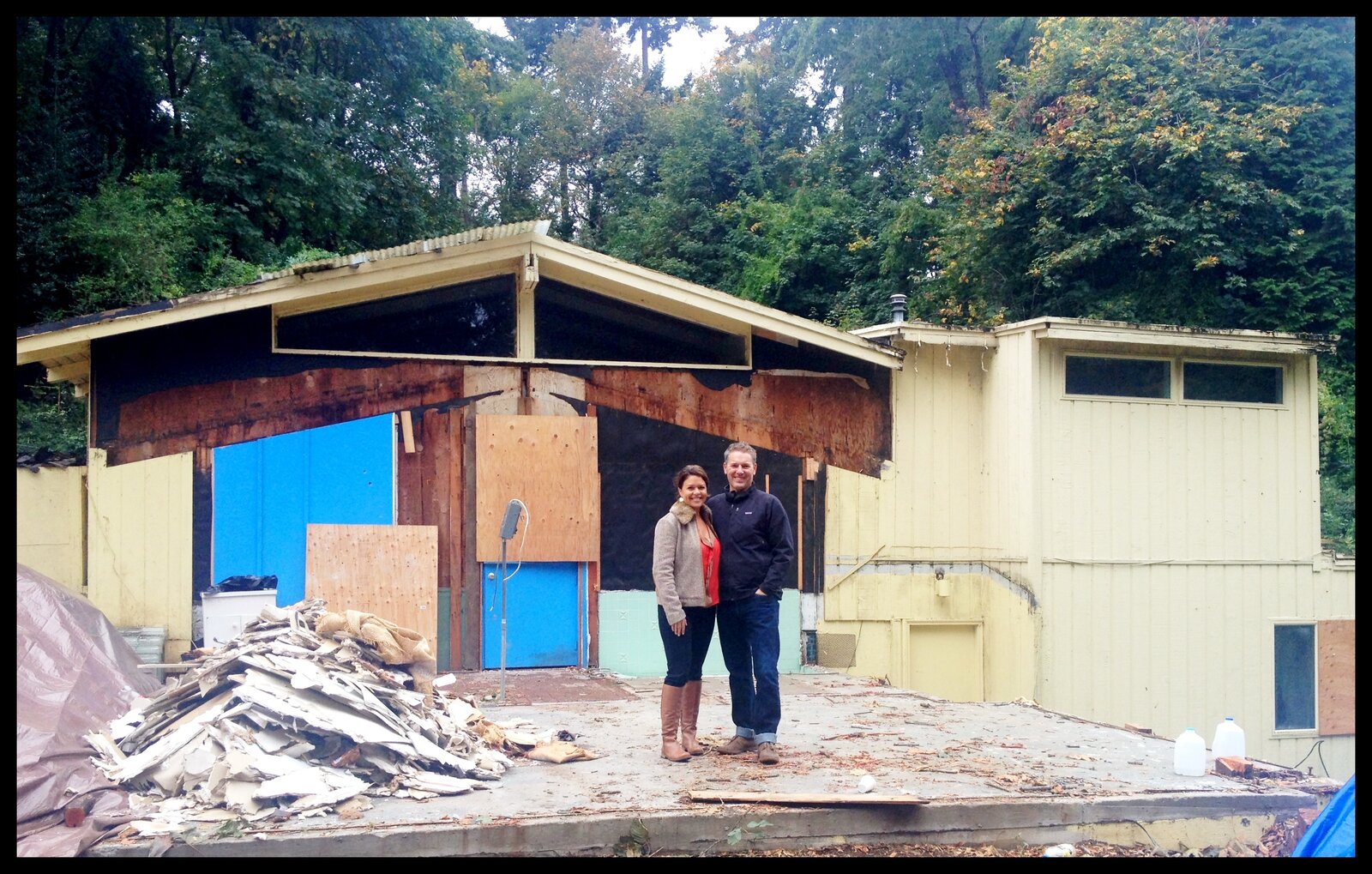 <span style="font-family: Theinhardt, -apple-system, BlinkMacSystemFont, &quot;Segoe UI&quot;, Roboto, Oxygen-Sans, Ubuntu, Cantarell, &quot;Helvetica Neue&quot;, sans-serif;">During: Holly and David stand in front of the home during the deconstruction process.</span>