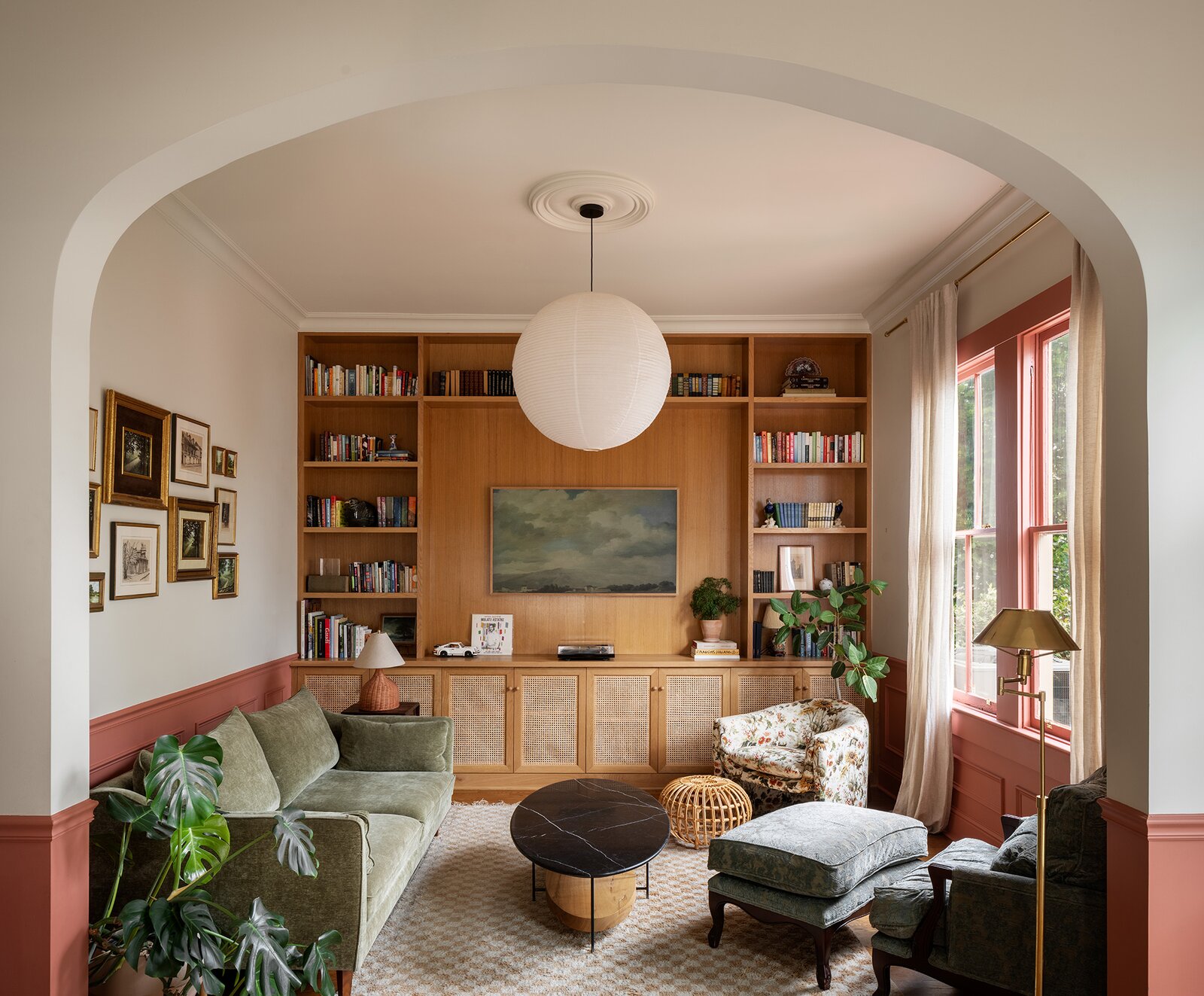 The couple added the wainscot, installed by Seamus, and painted in Farrow &amp; Ball Red Earth to continue the 