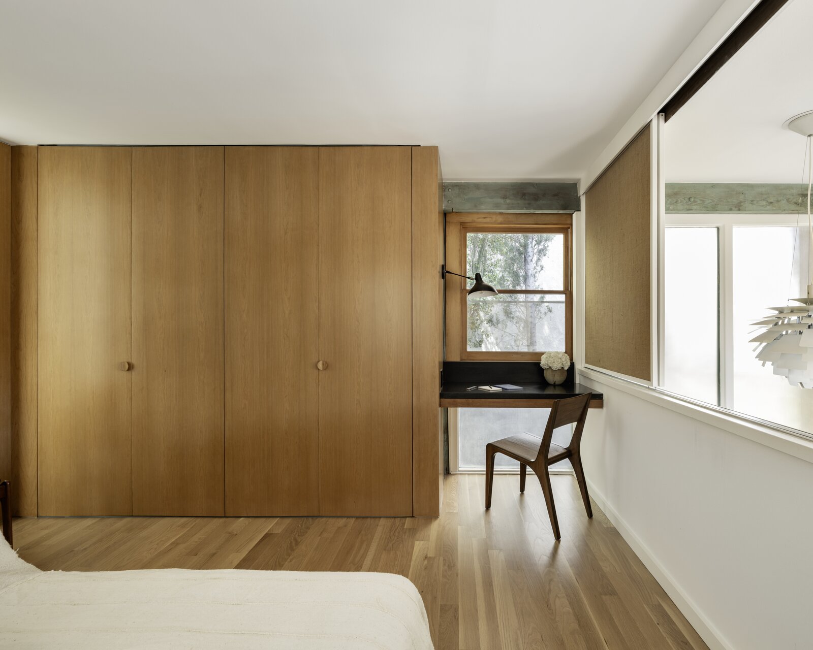 Cherry cabinets connect with the rest of the house and the built-in desk height was raised to be more comfortable.