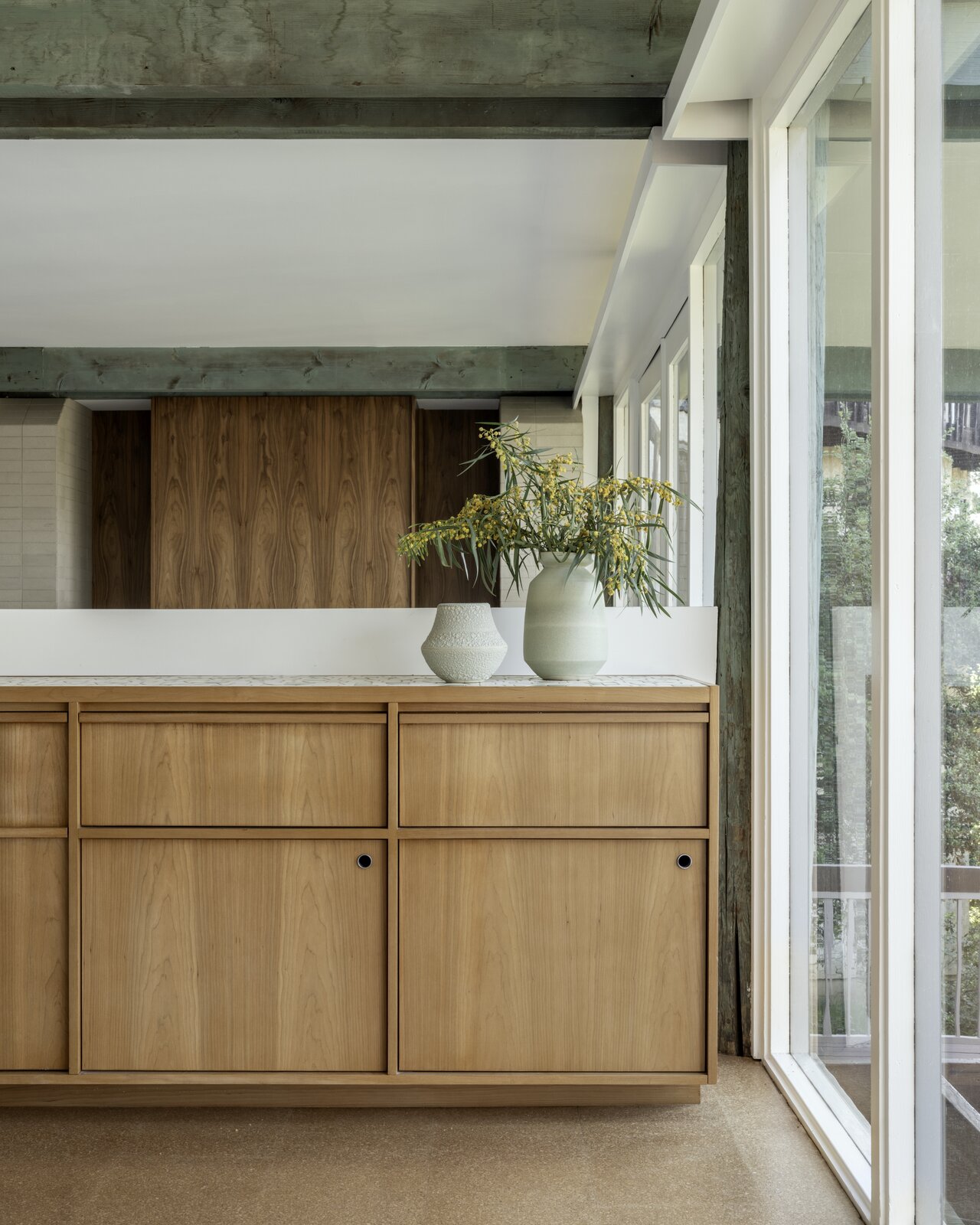 The original plans showed cabinetry placement along the pony wall, and Cover Architecture and EEK Studio gave it unique detailing.