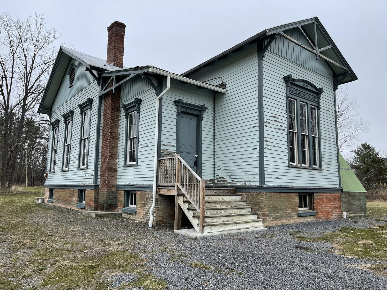 Before: The 1881 schoolhouse outside Hudson, New York, had sat vacant for a while before Joel Edmondson and Mimia Johnson bought it to convert into a single-family home.