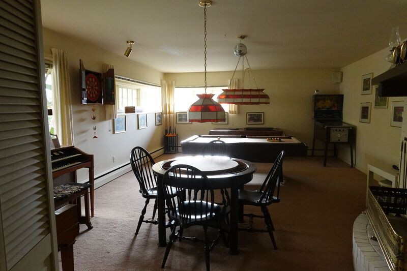 Before: Previously, the main living room had been set up as a games room, but the new plan restores it to its lounge status.