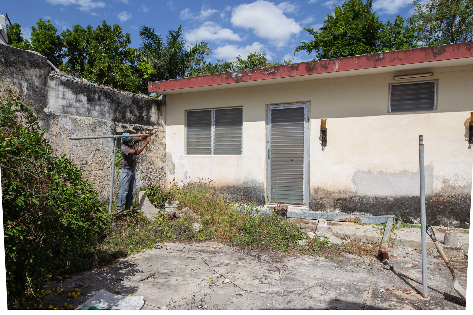 Before: This building was cleared away to make room for the pool.