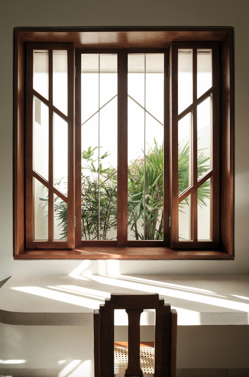 The wood windows have a custom muntin pattern that reflects traditional designs from the 1920s, but incorporates reeded glass in the upper portion rather than stained-glass. "That was a reinterpretation that we made,