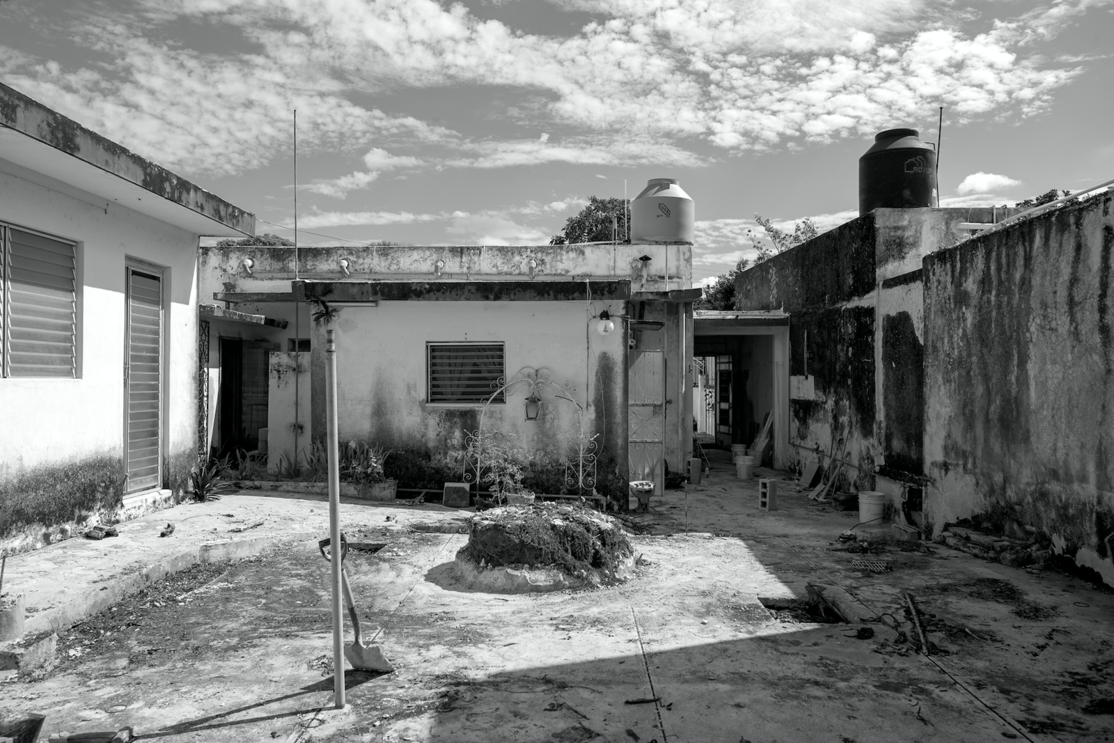 Before: The team removed the additional structures in the yard to make way for a pool and standalone primary suite.