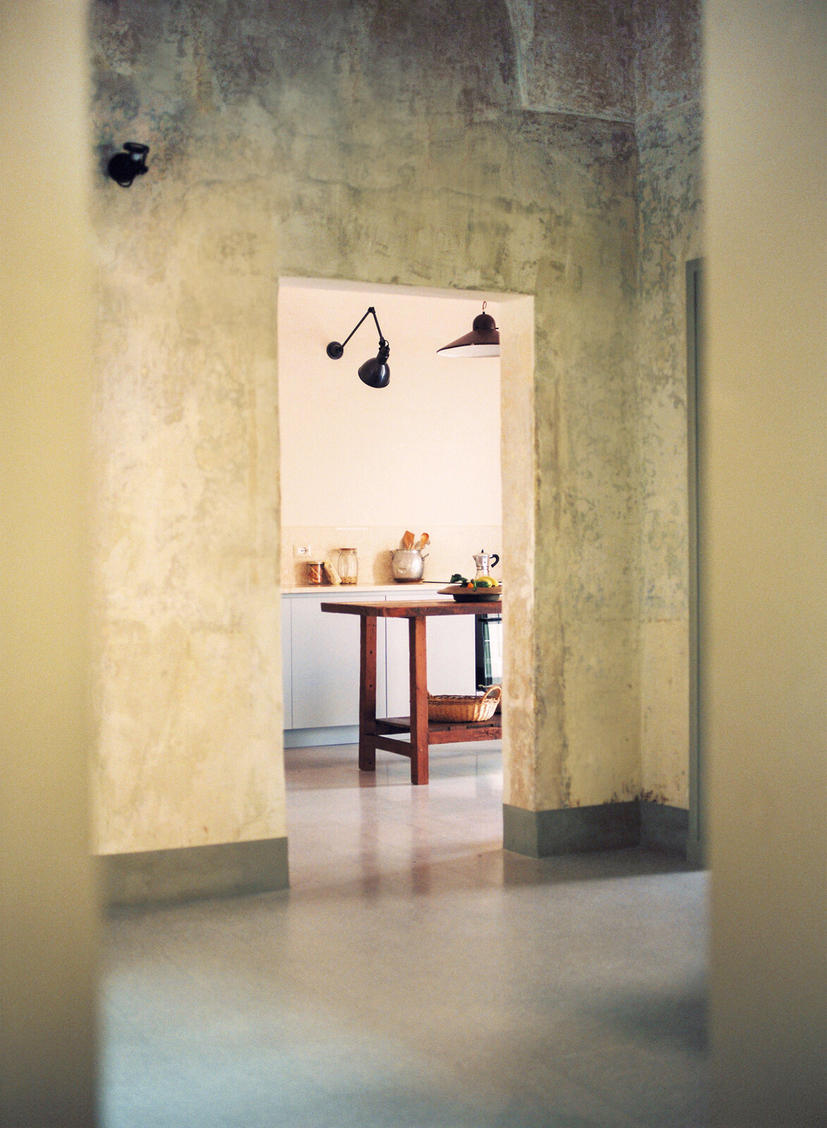 The flooring is comprised of traditional handmade tiles manufactured in the region, called 'cementine di graniglia,' says Manuel, and loosely translated as 'grit/terrazzo tiles.'