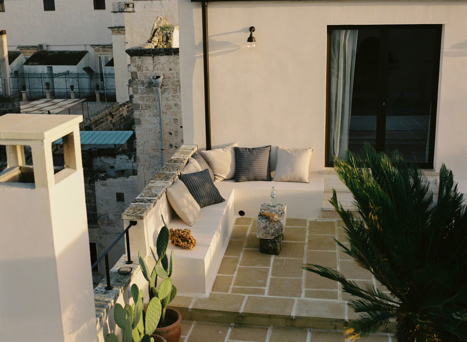 The lounge area, now with sandstone flooring, is comfortable in even colder weather. "Last year, we had Christmas lunch on the rooftop,