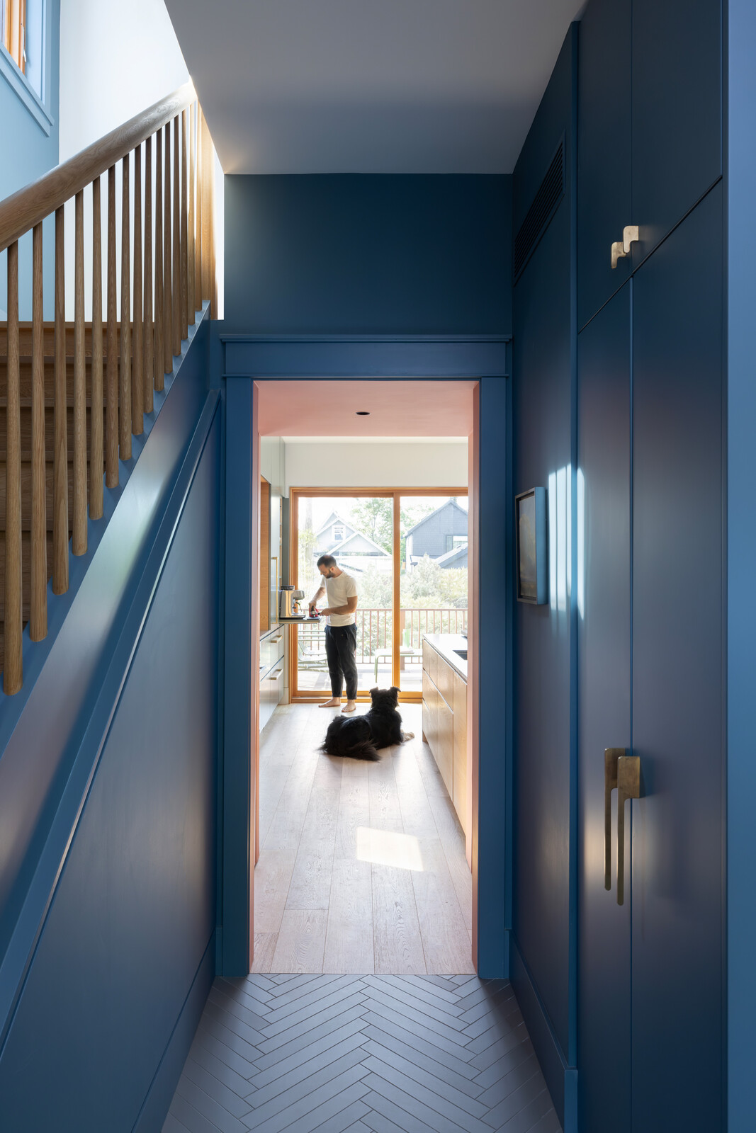 Streamlined trim, brass closet handles by BB Sweden, and a "gradation