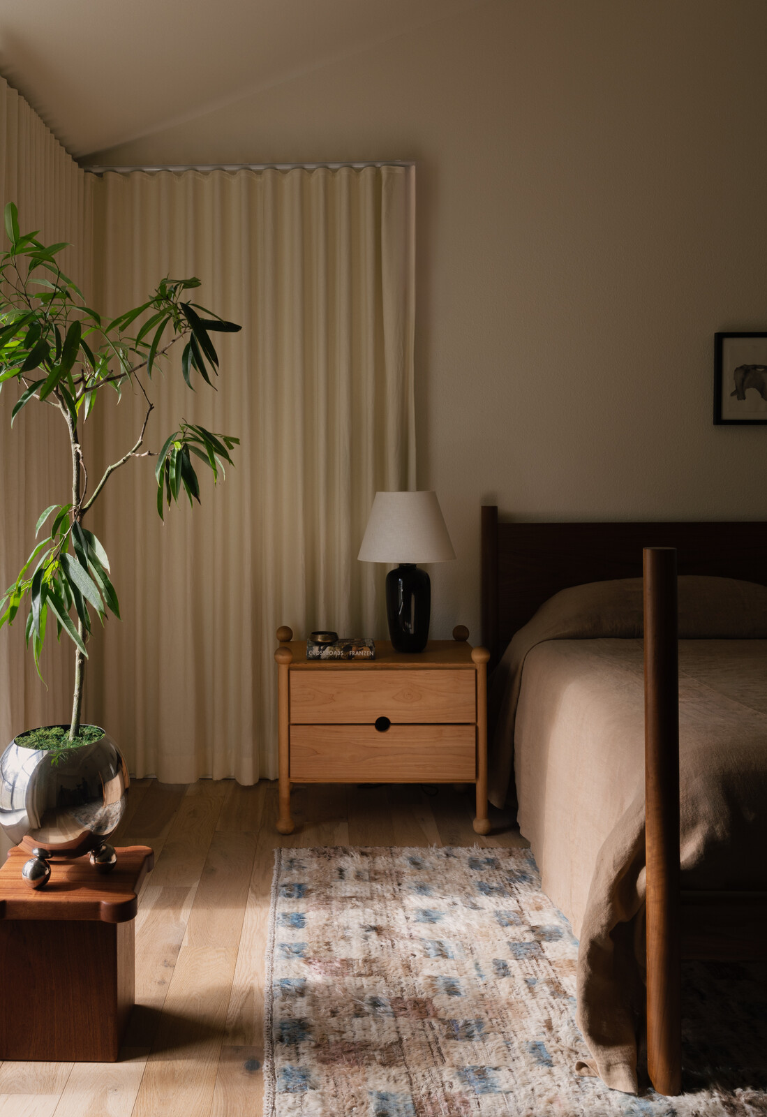 The Orion Side Table are by Muhly. The wall color throughout is Mascarpone, by Benjamin Moore.