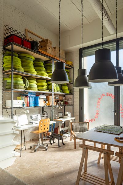 In Marcela's Barcelona live/work space for FÜÜR, racks of salvaged firehose are experimented with to create prototypes for new products. For design and fabrication, Marcela collaborates with local industrial designers and leather artisans in Southern Spain.