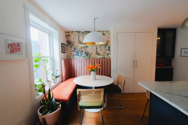Ellie installed the Étoffe wallpaper over the banquette seat.
