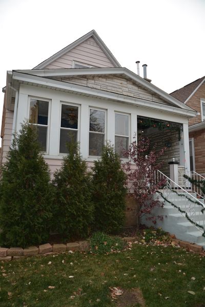 Before: Kris Rey and Kev Cahill's Chicago bungalow was originally built in 1900, and Kris bought it in 2011 from the descendants of the family who originally built it.