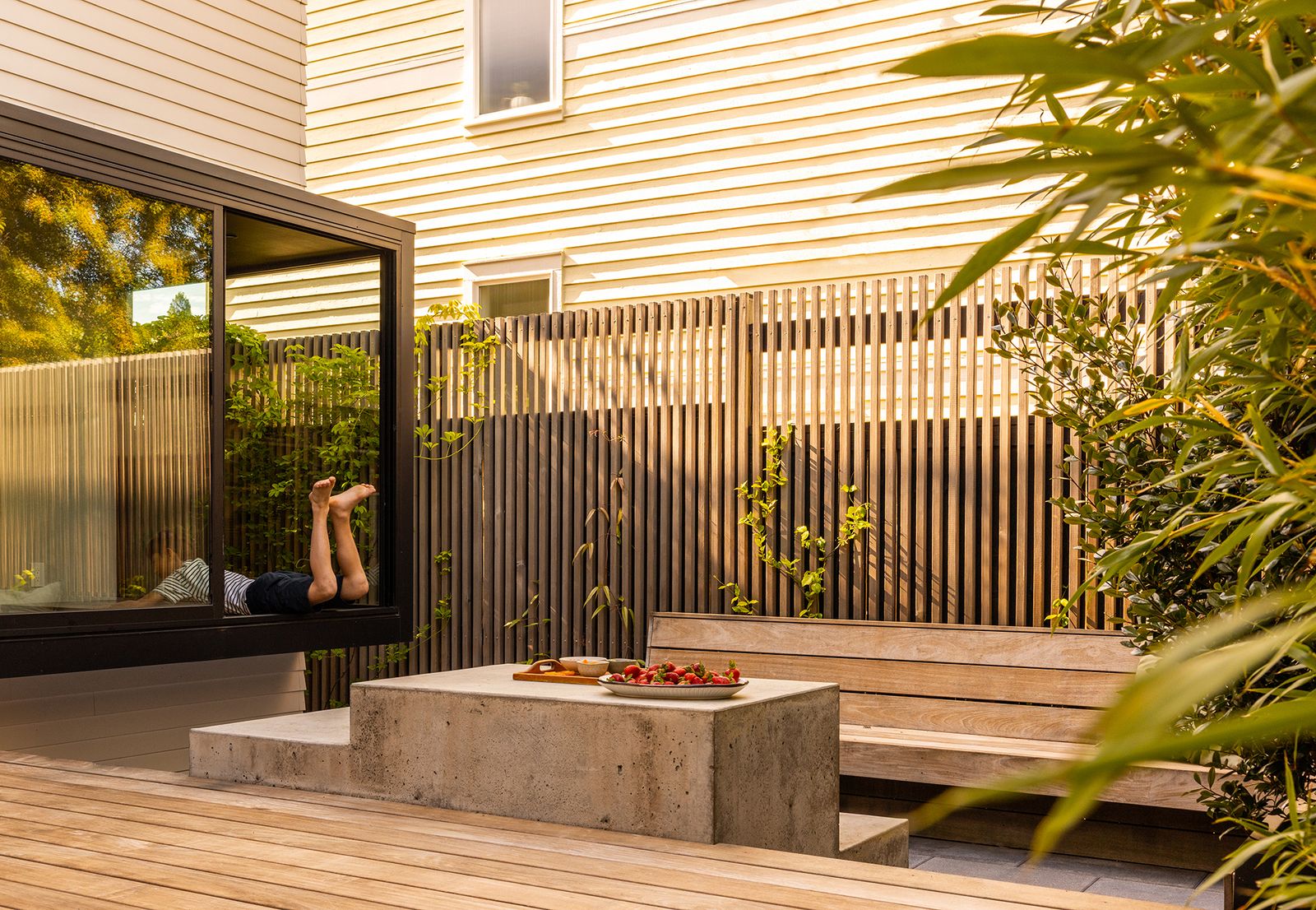 The seating is "tucked down and against the concrete so it creates a little microclimate,