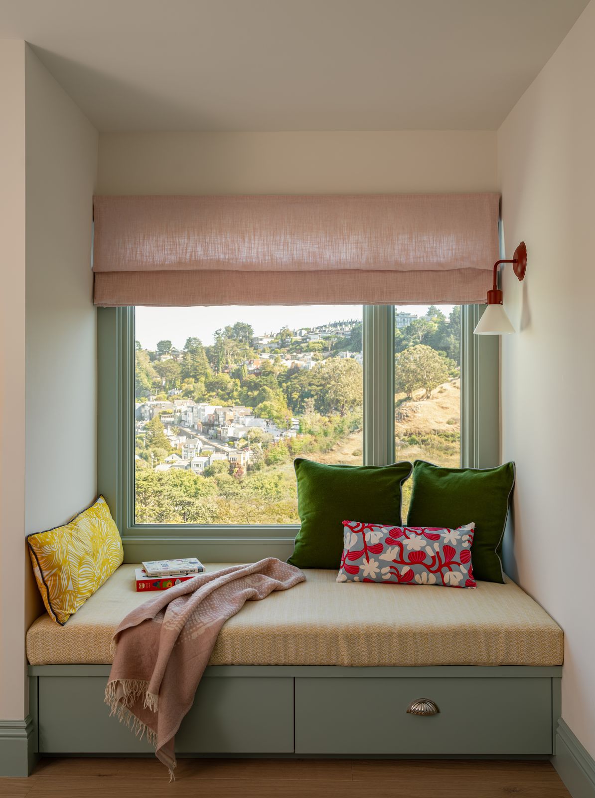 The children's bedroom has a daybed with paint colors, fabrics, and lighting all chosen by Mackenzie.