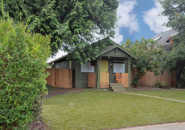 In 2021, Lara White and Jason Stamp of Workaday Design bought the house next door in order to save the cedar tree between them. It has 580 square feet, with one bedroom, and one bathroom.